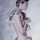 Illustration for article titled This is what a dress made of 3,000 cow nipples looks like